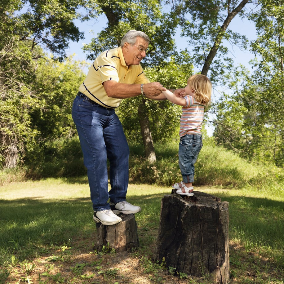 Senior Man and Child Playing